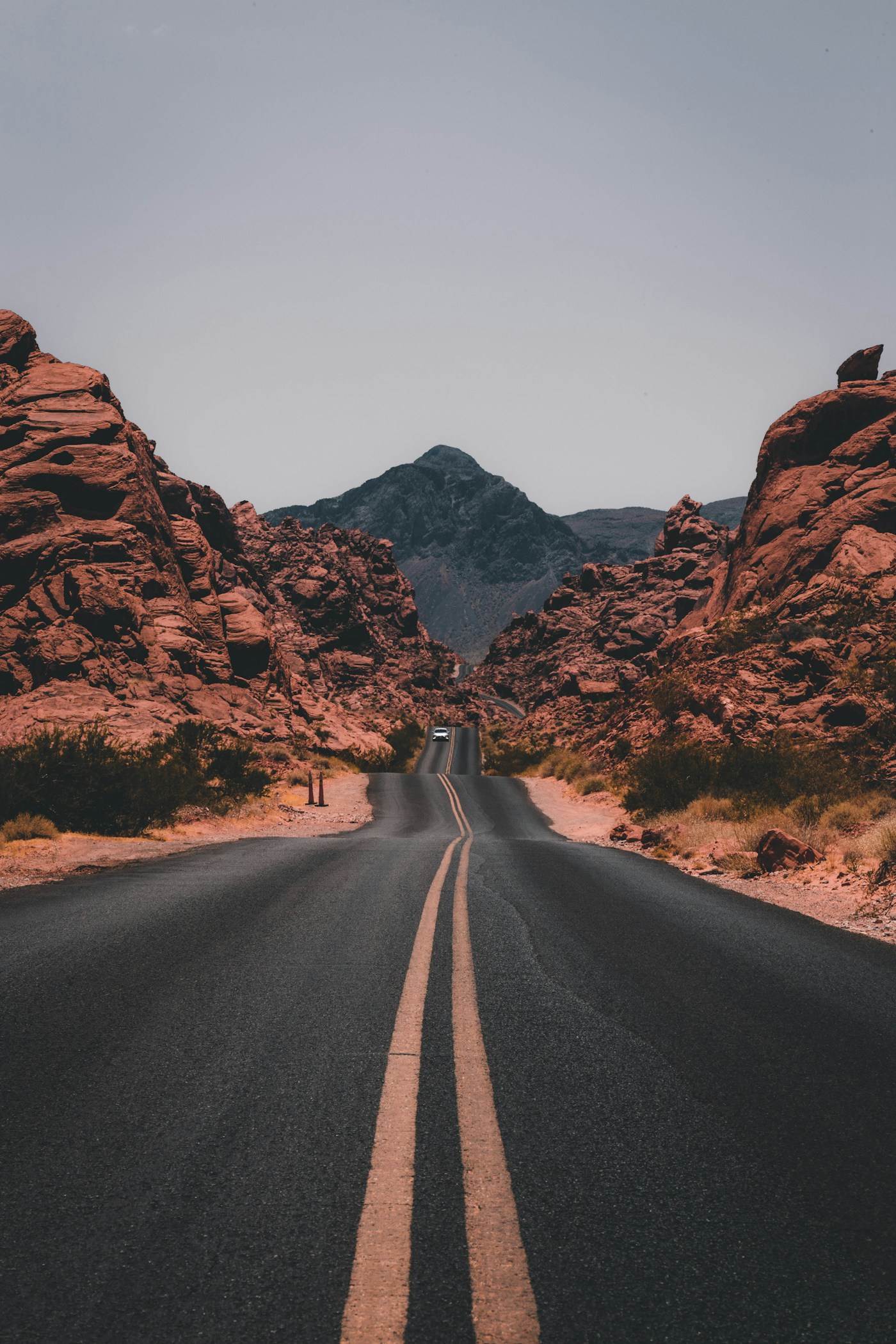 Mountain road winding through a dramatic landscape